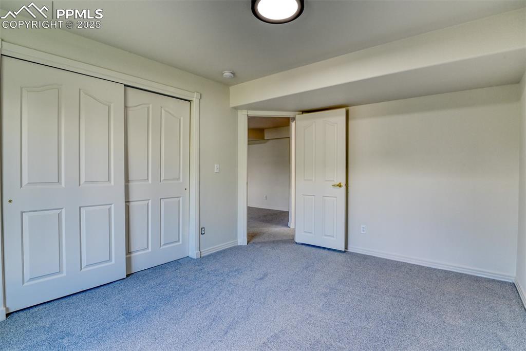 1431 Madison Ridge Heights, Unit C Colorado Springs, CO 80904 - Photo 36 of 44 a view of an empty room