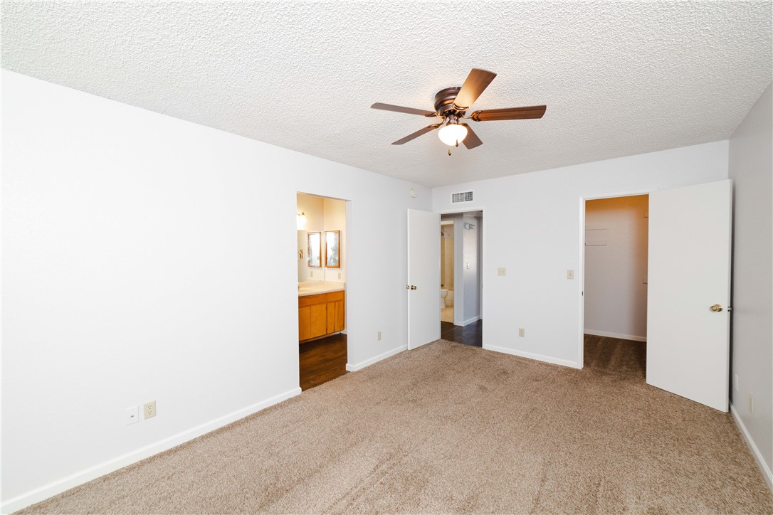 980 Canyon Hills Road Kingman, AZ 86409 - Photo 19 of 42 a view of room with a ceiling fan