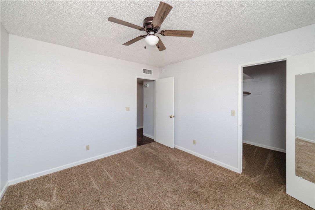 980 Canyon Hills Road Kingman, AZ 86409 - Photo 26 of 42 a view of a room with a ceiling fan