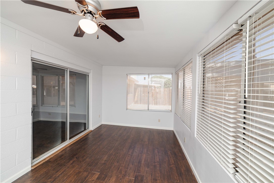 980 Canyon Hills Road Kingman, AZ 86409 - Photo 32 of 42 wooden floor in an empty room with a window