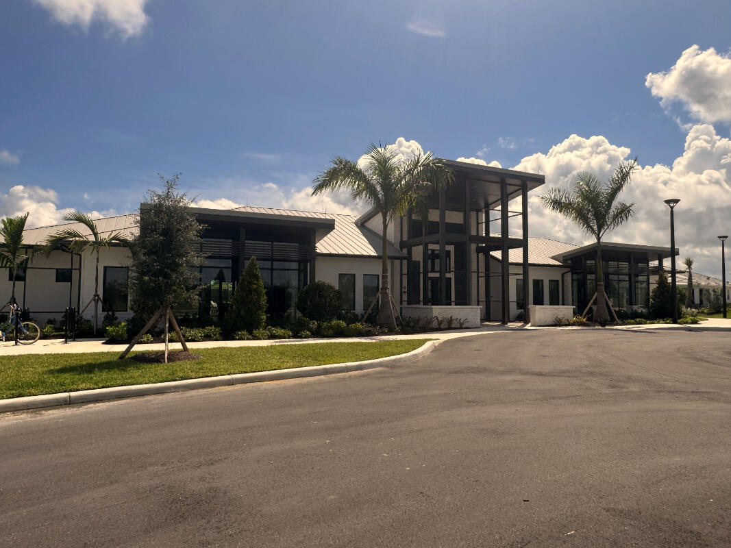 9941 Southwest Legacy Drive Stuart, FL 34997 - Photo 31 of 33 a view of a building with a street