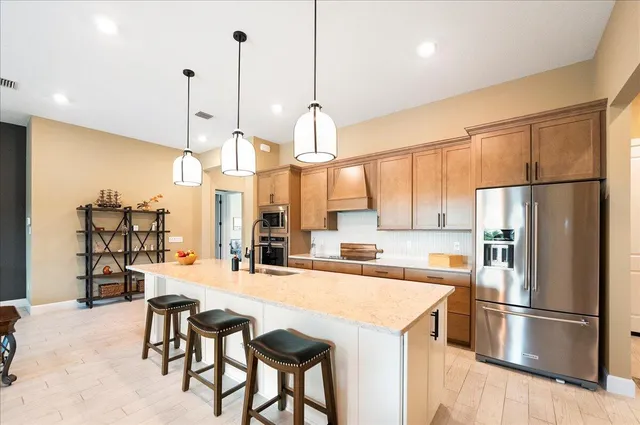 $695,000 | 9941 Southwest Legacy Drive, Stuart, FL 34997