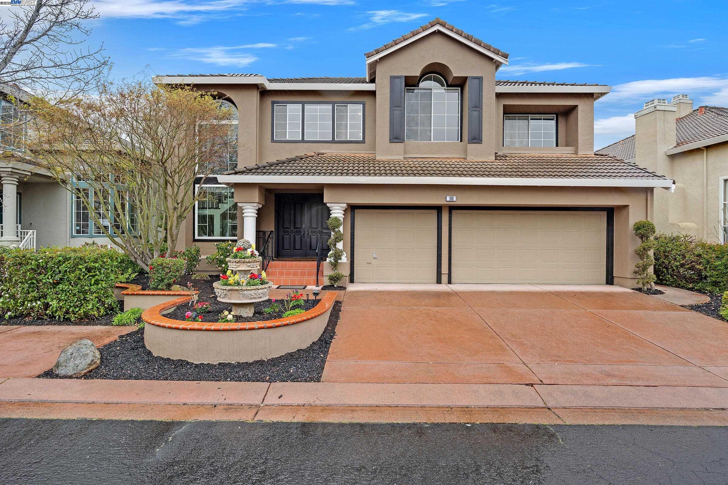 108 Victory Circle San Ramon, CA 94582 - Photo 1 of 1 a front view of a house with a yard and a garage