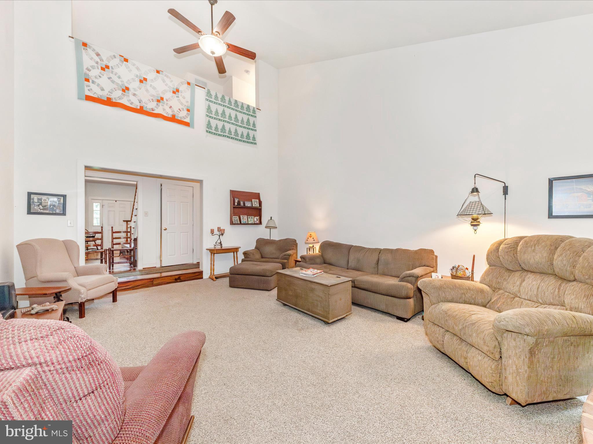 13013 Draper Road Clear Spring, MD 21722 - Photo 15 of 53 a living room with furniture and a flat screen tv