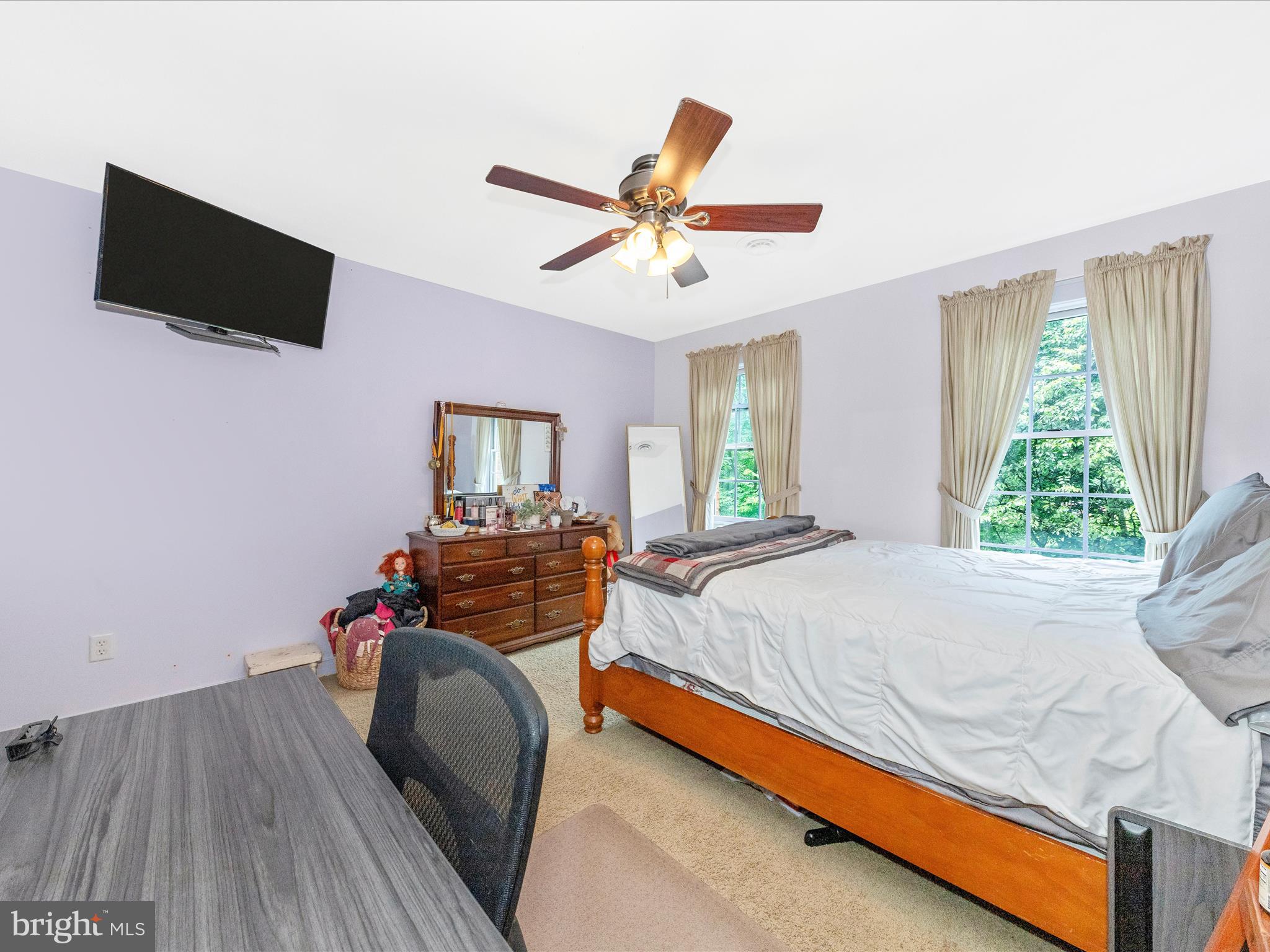 13013 Draper Road Clear Spring, MD 21722 - Photo 36 of 53 a bedroom with a bed and a flat screen tv