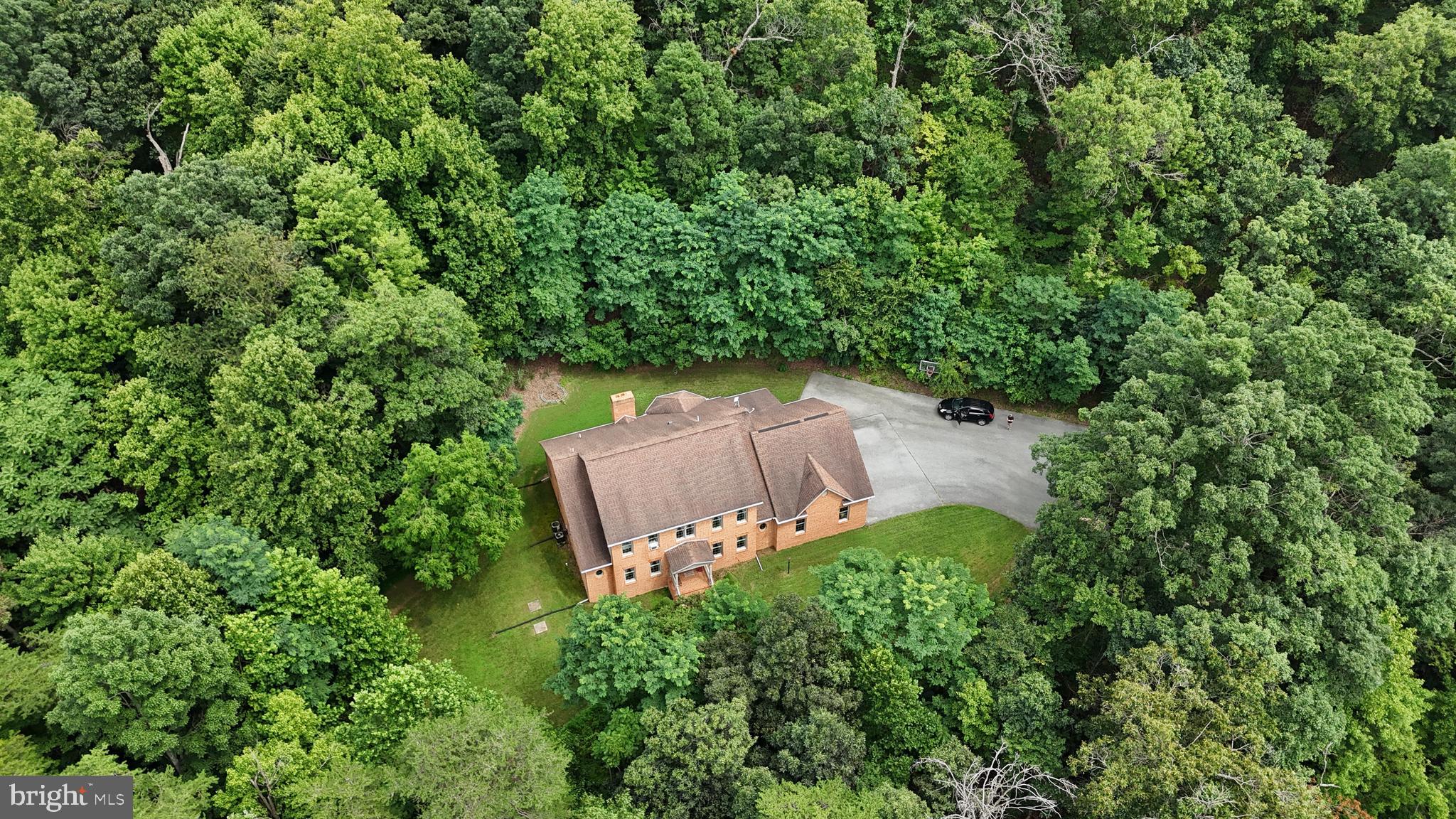 13013 Draper Road Clear Spring, MD 21722 - Photo 4 of 53 an aerial view of a house with a yard and covered with trees