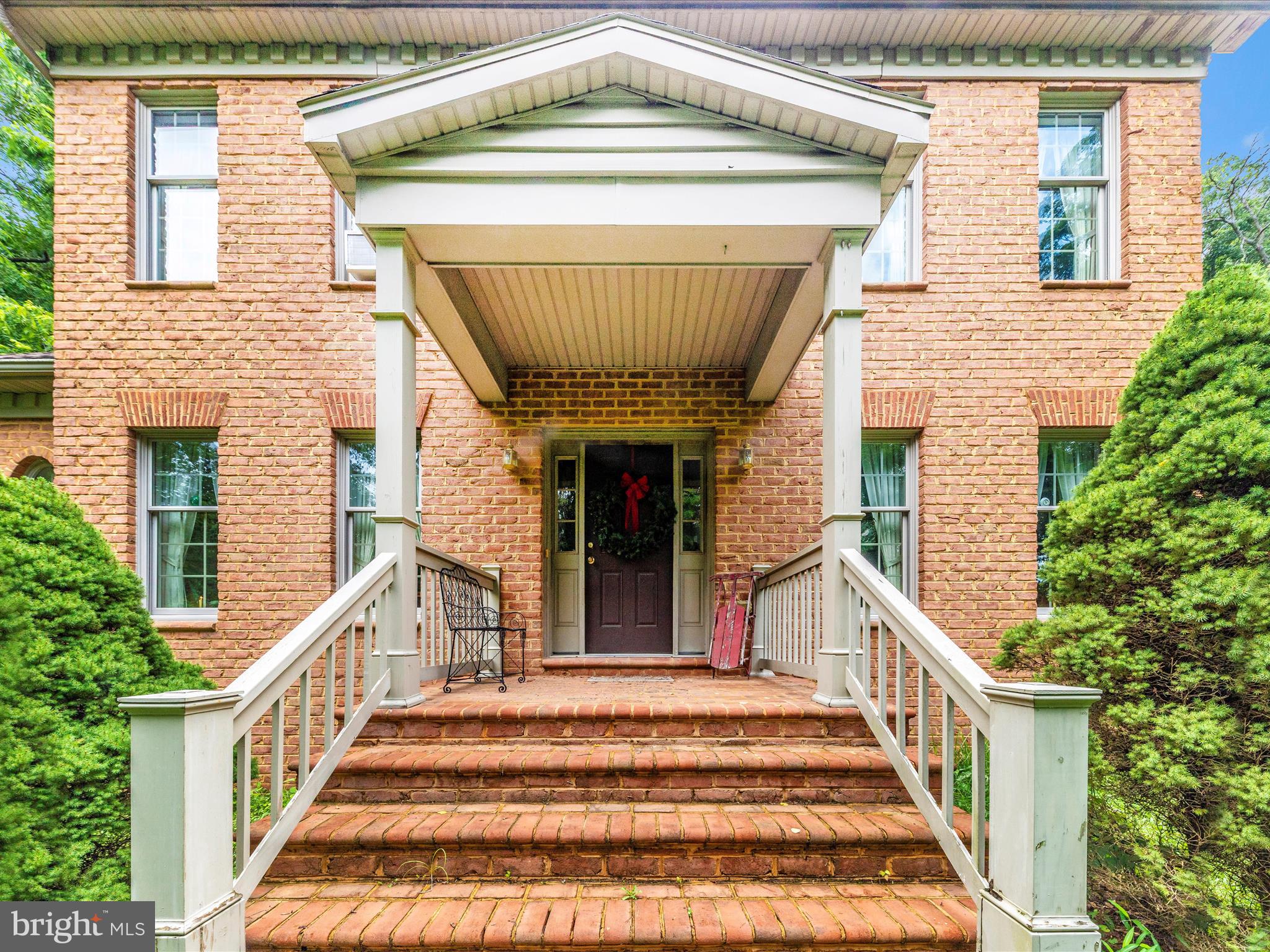 13013 Draper Road Clear Spring, MD 21722 - Photo 45 of 53 a view of a house with large windows and stairs