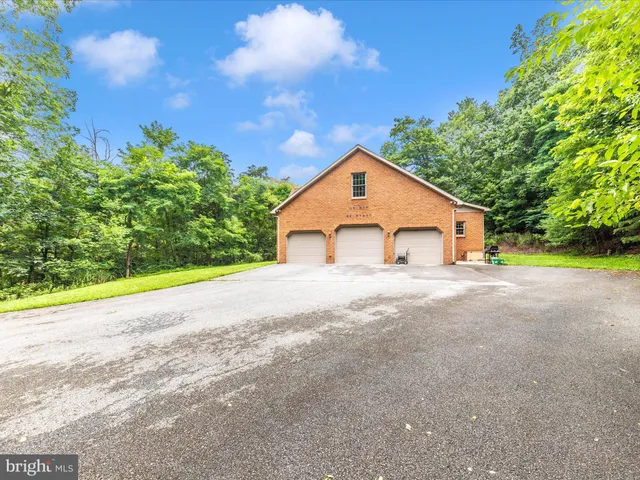a view of a fence in a garden