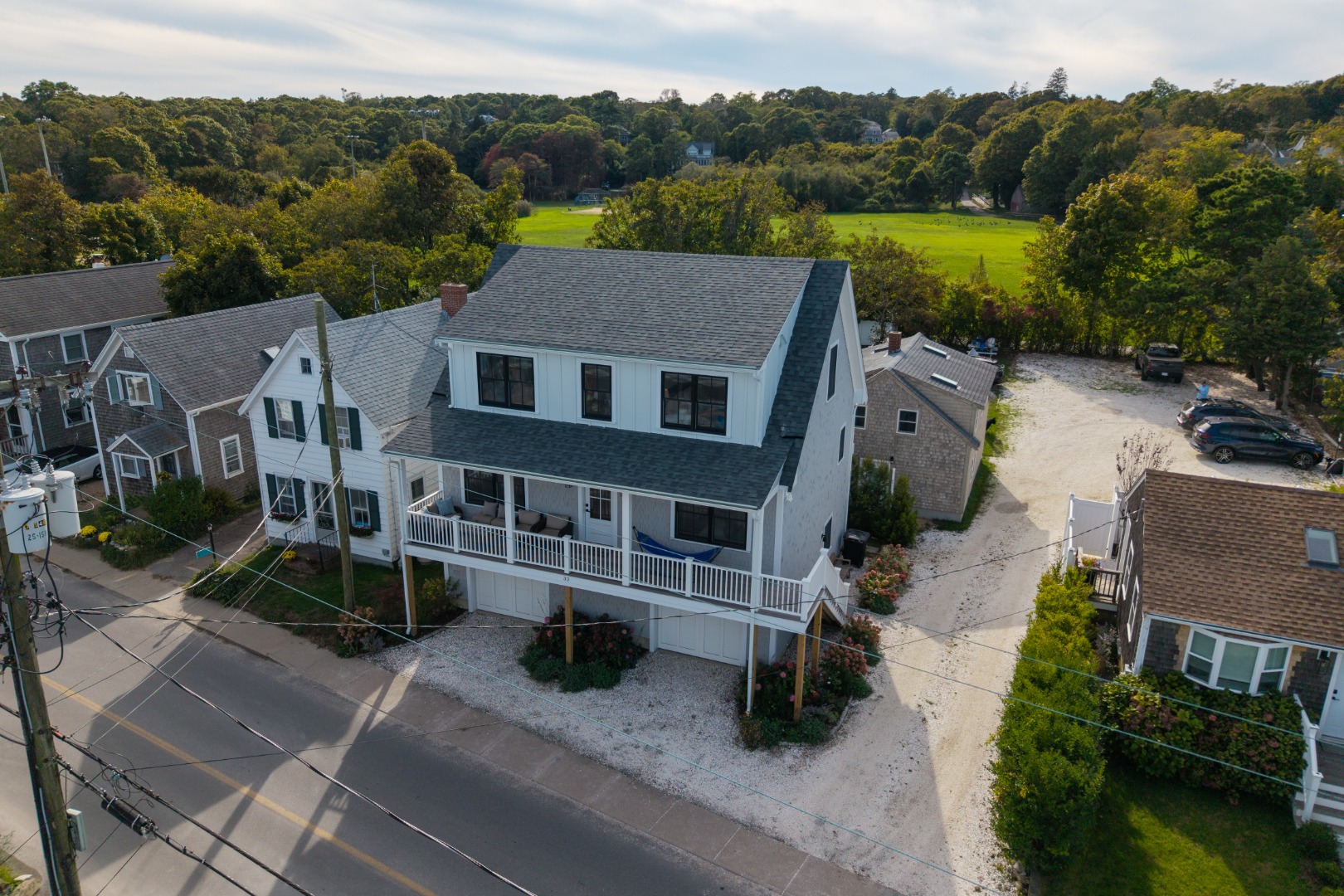 33 Lagoon Pond Road Vineyard Haven, MA 02568 - Photo 39 of 42 an aerial view of a house with a garden