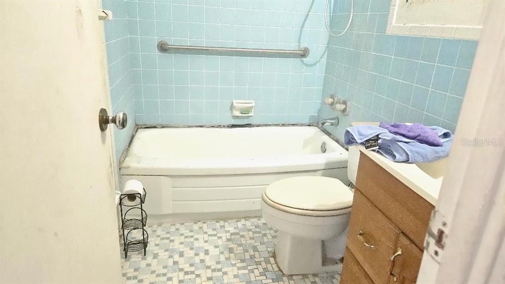 6542 Gem Lane Seminole, FL 33772 - Photo 11 of 19 a bathroom with a sink and a toilet