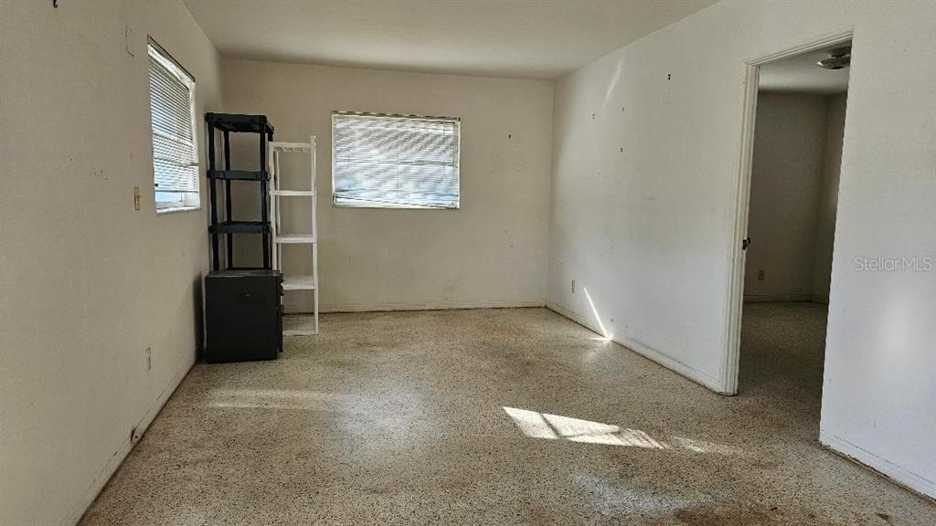 6542 Gem Lane Seminole, FL 33772 - Photo 6 of 19 an empty room with windows