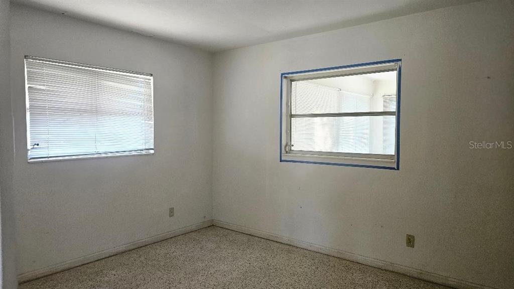 6542 Gem Lane Seminole, FL 33772 - Photo 7 of 19 an empty room with a window