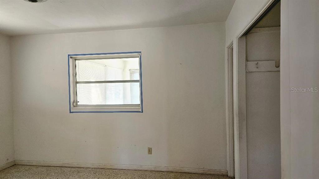 6542 Gem Lane Seminole, FL 33772 - Photo 8 of 19 an empty room with a window