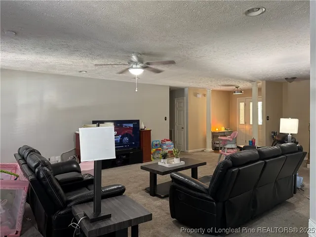 a bathroom with a toilet and a mirror