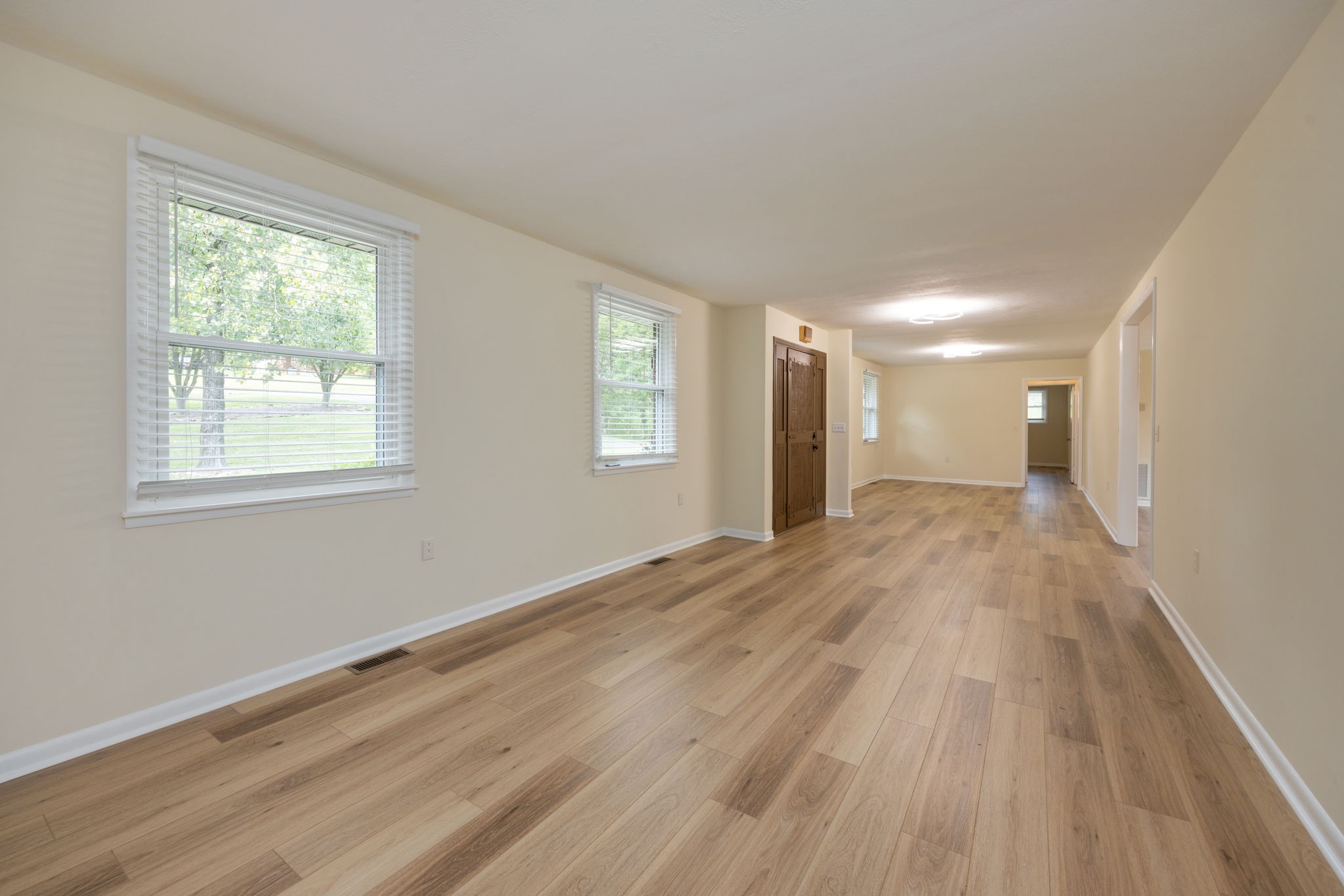162 Searcy Road Mount Juliet, TN 37122 - Photo 11 of 46 a view of empty room with wooden floor and fan