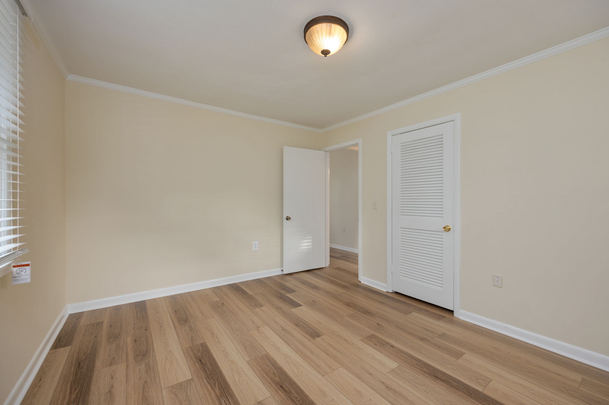 162 Searcy Road Mount Juliet, TN 37122 - Photo 23 of 46 an empty room with wooden floor and windows