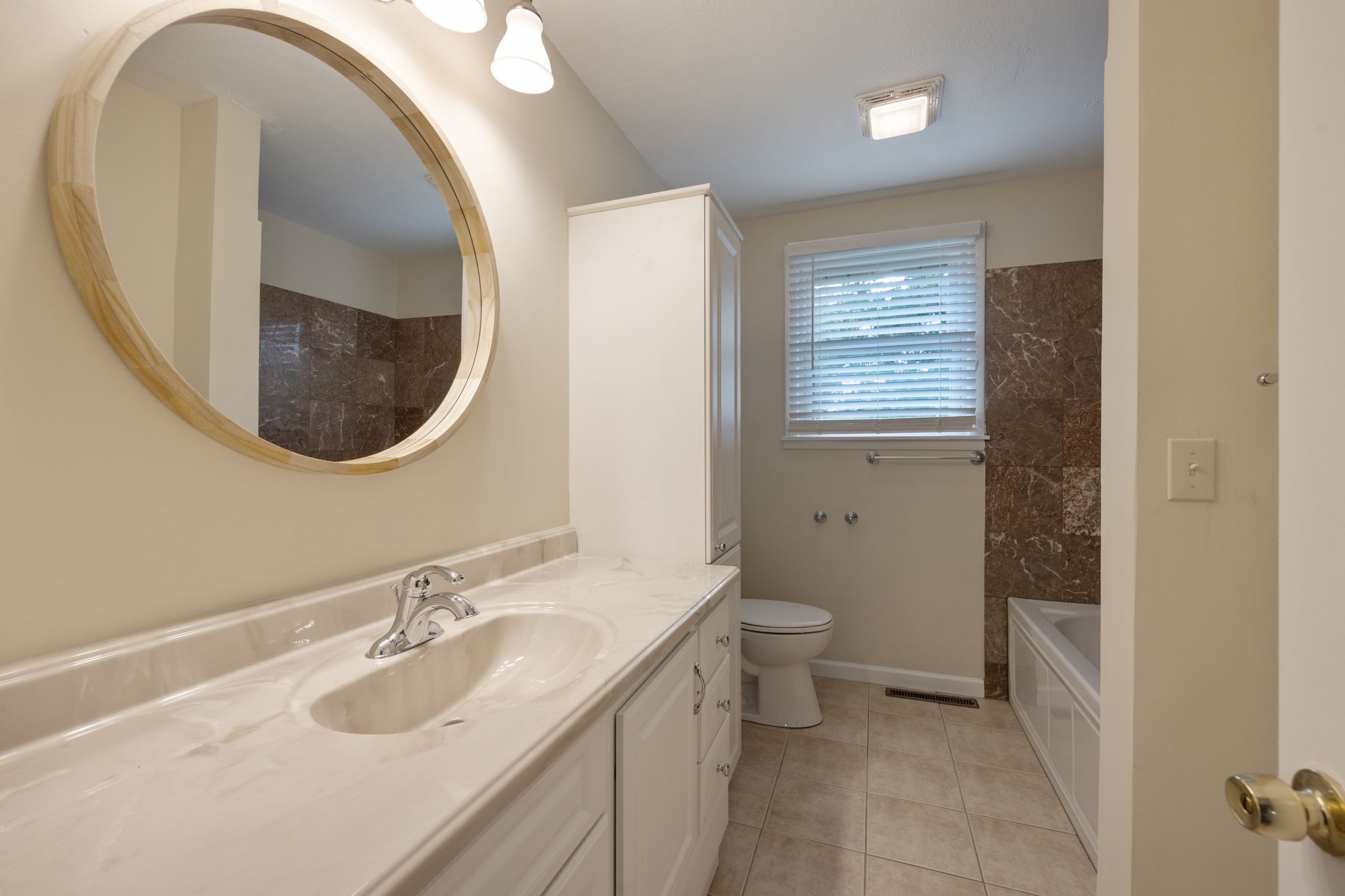 162 Searcy Road Mount Juliet, TN 37122 - Photo 24 of 46 a bathroom with a sink and a mirror
