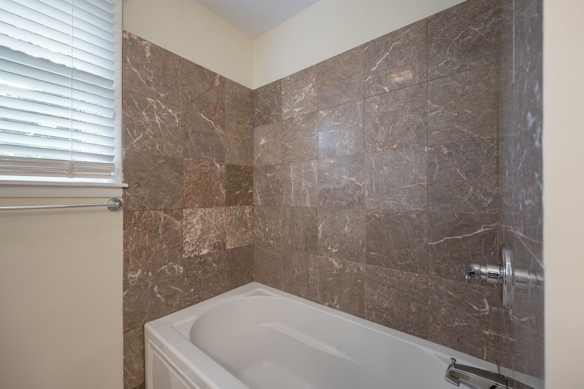 162 Searcy Road Mount Juliet, TN 37122 - Photo 25 of 46 a bathroom with a white bath tub and a shower