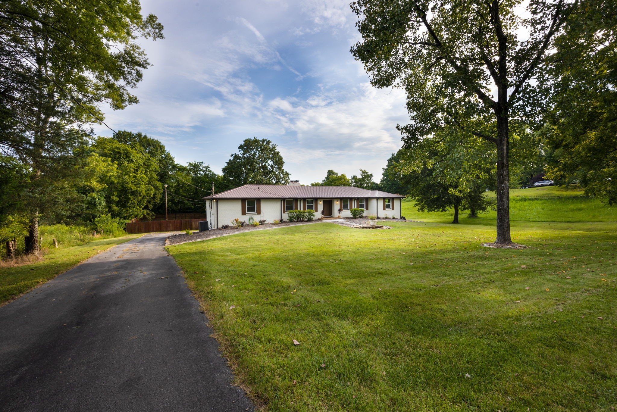 162 Searcy Road Mount Juliet, TN 37122 - Photo 3 of 46 a front view of a house with a yard