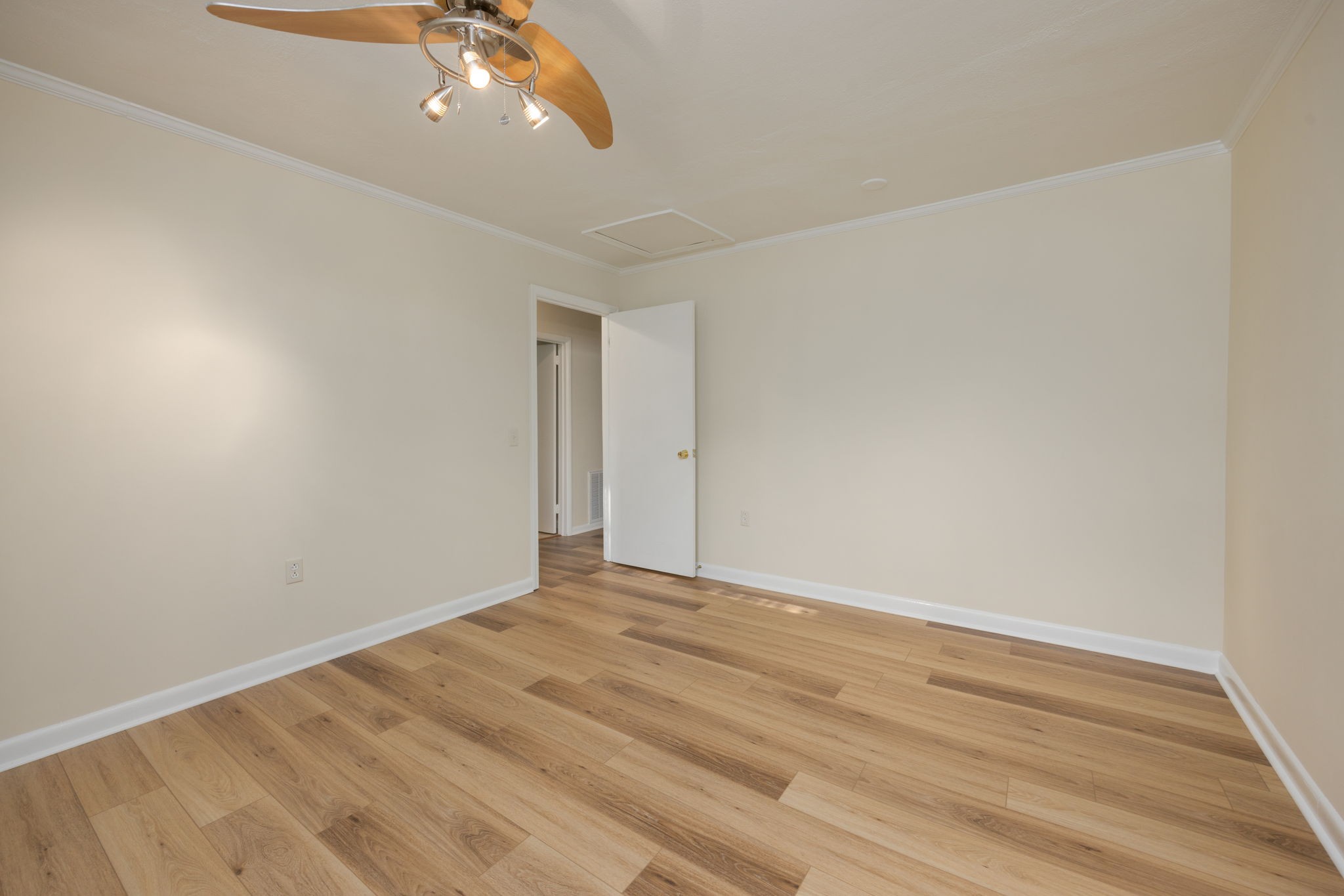 162 Searcy Road Mount Juliet, TN 37122 - Photo 31 of 46 a view of an empty room with wooden floor and a window