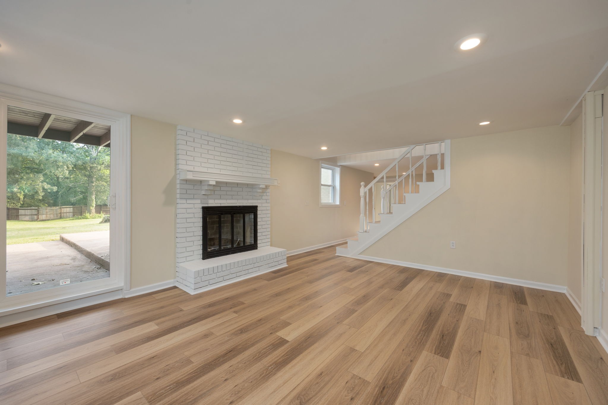 162 Searcy Road Mount Juliet, TN 37122 - Photo 32 of 46 a view of an empty room with wooden floor and a window