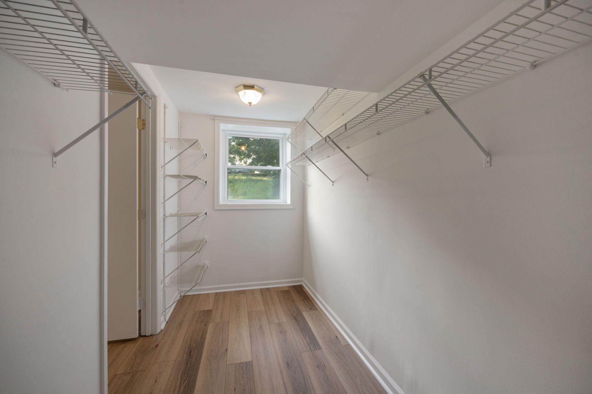 162 Searcy Road Mount Juliet, TN 37122 - Photo 34 of 46 a view of small space with racks on the wall