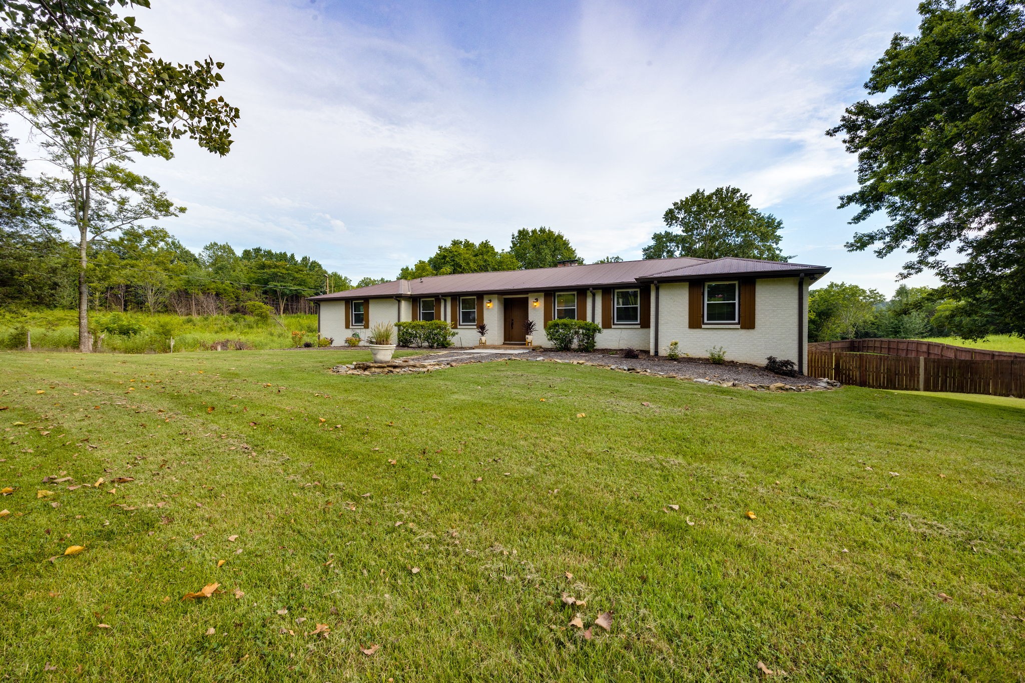 162 Searcy Road Mount Juliet, TN 37122 - Photo 4 of 46 a view of a house with a yard