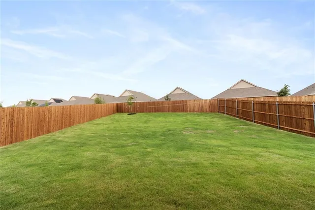 a view of an outdoor space and a yard