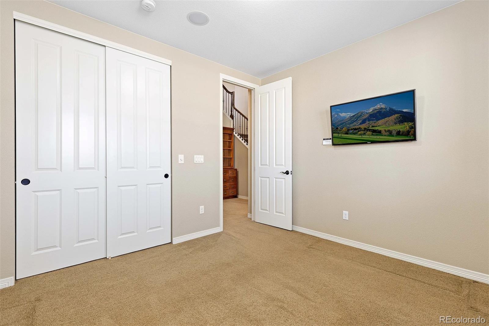 9581 Firenze Way Highlands Ranch, CO 80126 - Photo 29 of 48 a view of an empty room
