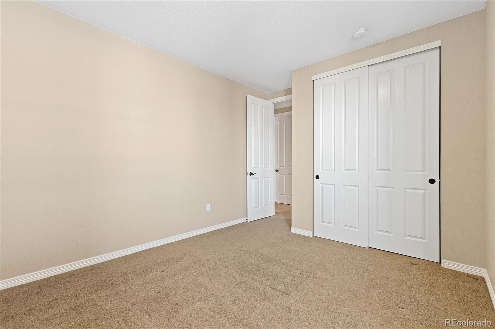 9581 Firenze Way Highlands Ranch, CO 80126 - Photo 32 of 48 a view of an empty room