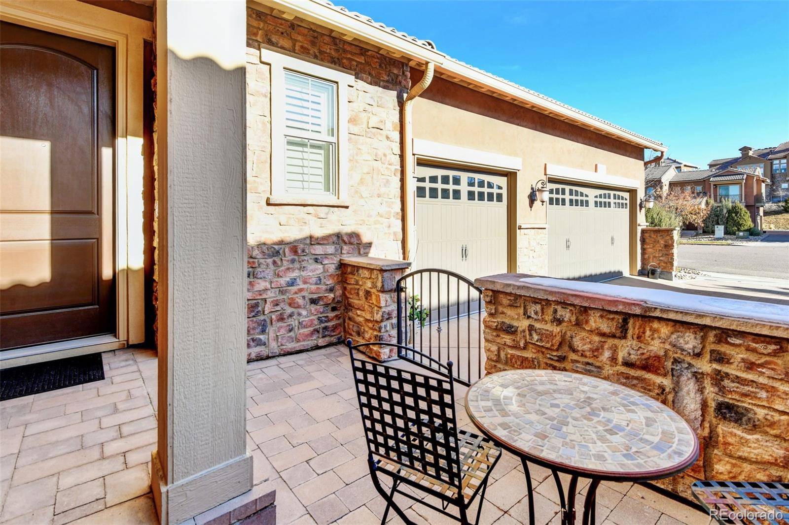 9581 Firenze Way Highlands Ranch, CO 80126 - Photo 8 of 48 a view of a balcony with furniture