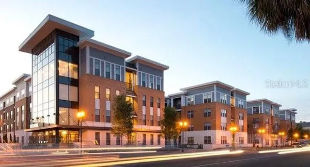 a view of a building with a yard