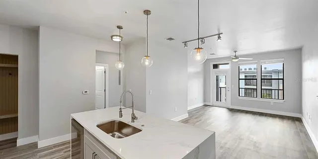 a view of a dinning table and chairs in the patio