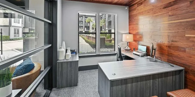 a view of balcony with furniture