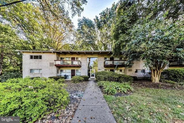 front view of a house with a small yard