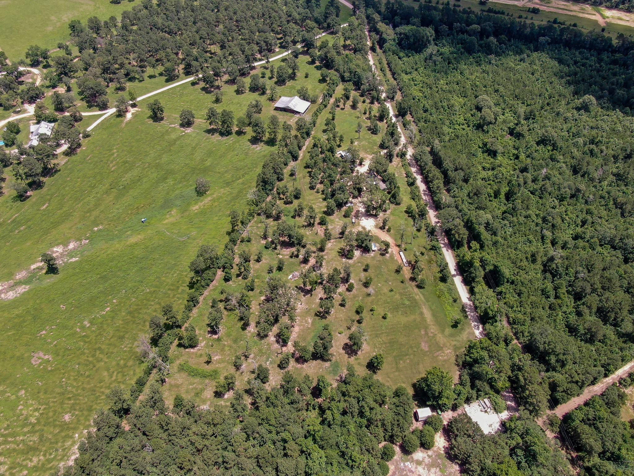 400 Raven Hill Road Oakhurst, TX 77359 - Photo 43 of 45 a view of a green field