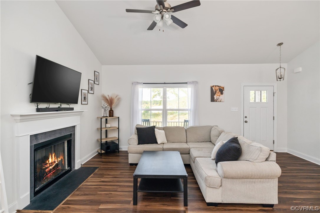 922 Kennon Road Mineral, VA 23117 - Photo 11 of 36 a living room with furniture and a fireplace