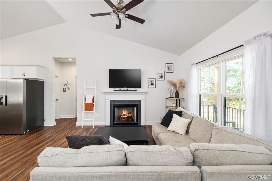 922 Kennon Road Mineral, VA 23117 - Photo 12 of 36 a living room with furniture and a fireplace
