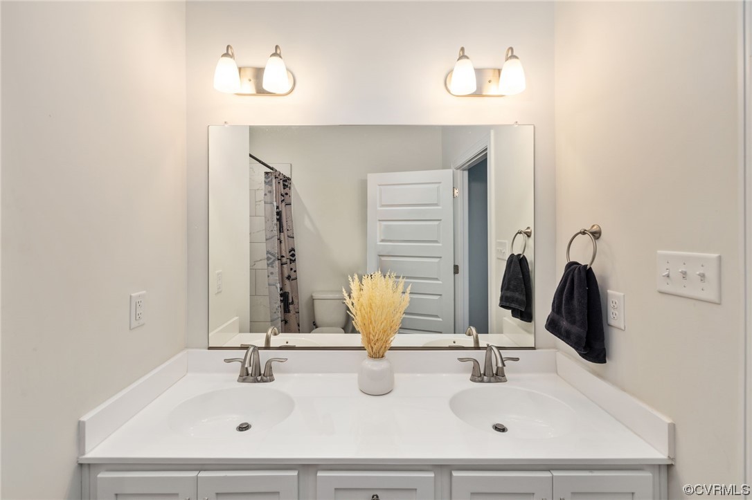 922 Kennon Road Mineral, VA 23117 - Photo 22 of 36 a bathroom with a sink and a mirror