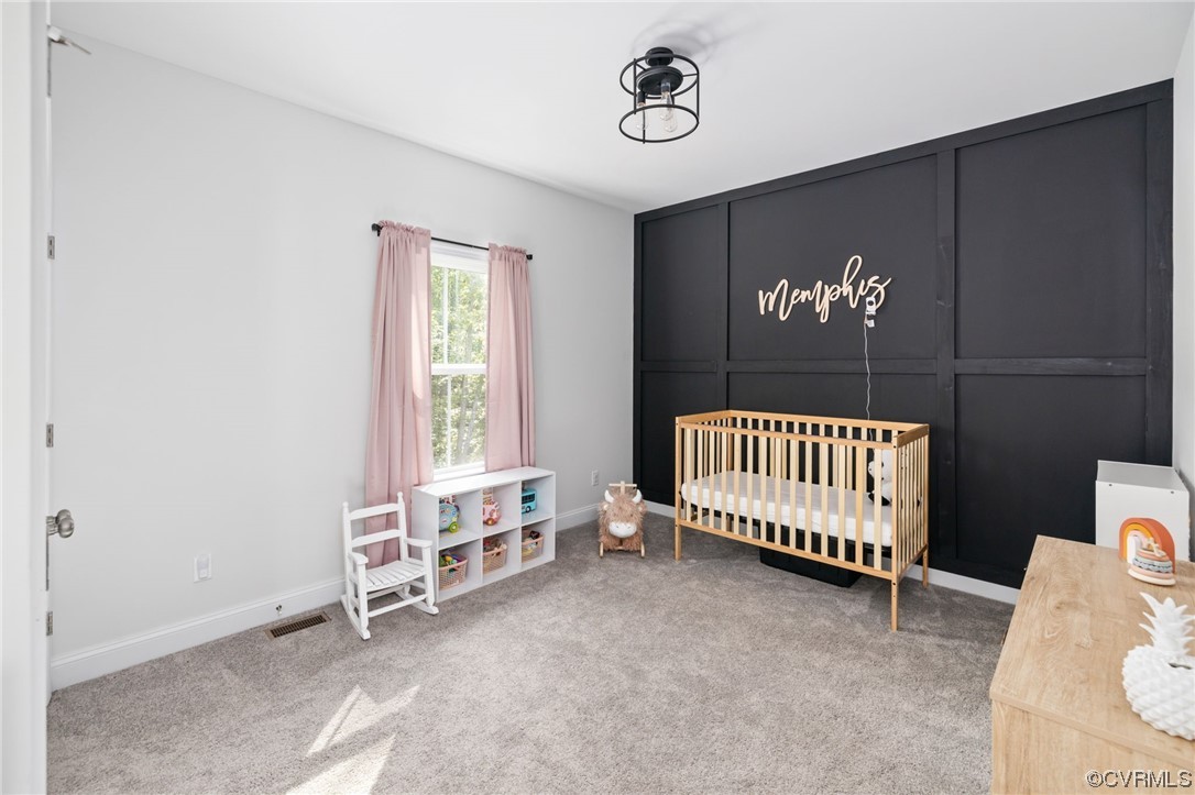 922 Kennon Road Mineral, VA 23117 - Photo 24 of 36 a bedroom with a small bed and a window