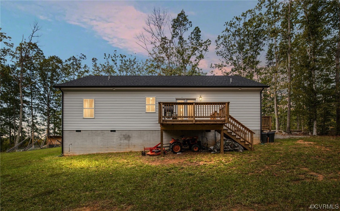 922 Kennon Road Mineral, VA 23117 - Photo 36 of 36 a view of a backyard with a large tree