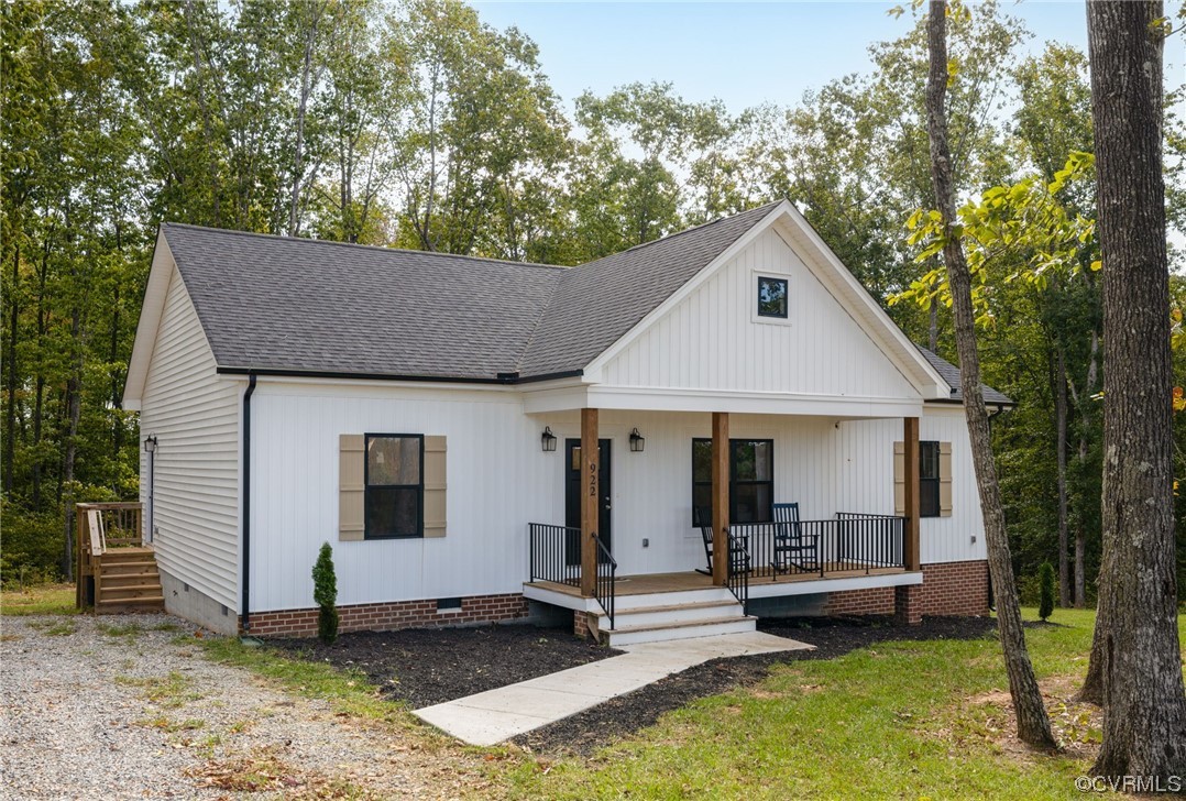 922 Kennon Road Mineral, VA 23117 - Photo 5 of 36 a house view with a garden and trees