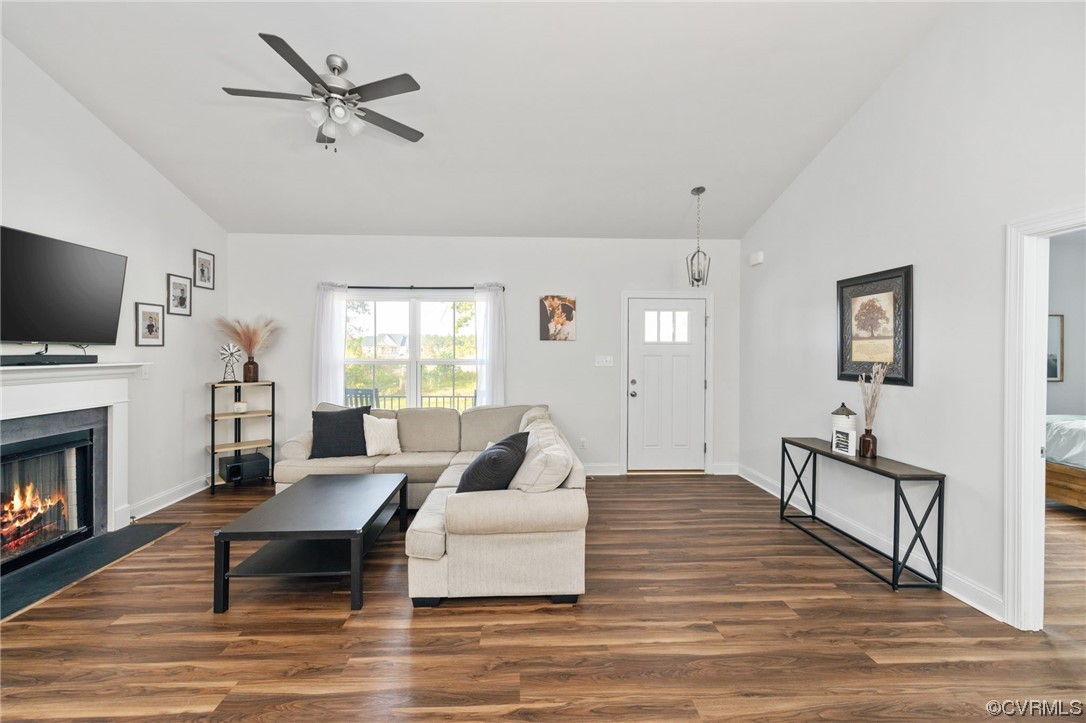 922 Kennon Road Mineral, VA 23117 - Photo 9 of 36 a living room with furniture and a fireplace