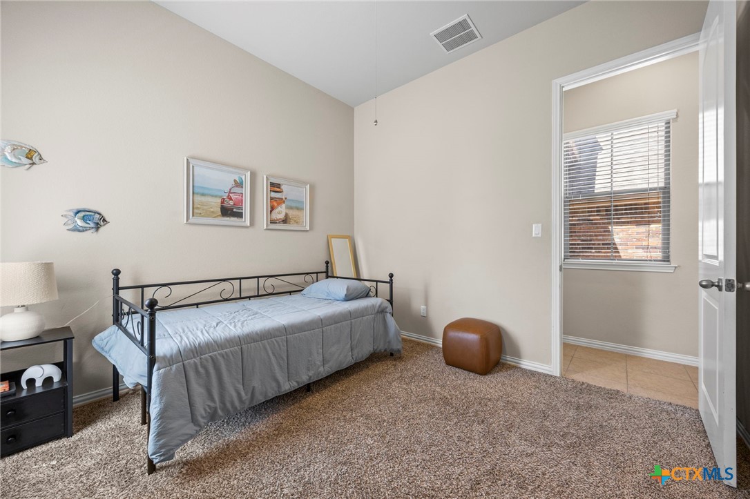1205 Winding Way Drive Georgetown, TX 78628 - Photo 15 of 39 Another view of the secondary bedroom.