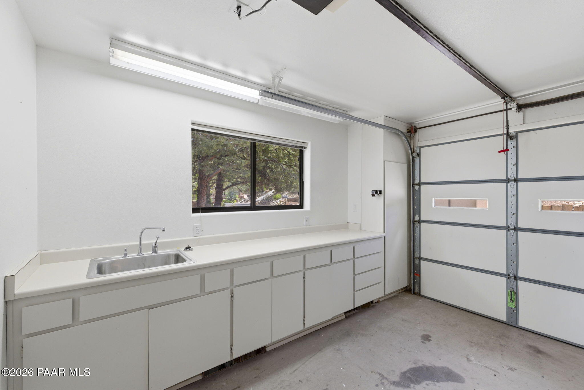 1140 Tanglewood Road Prescott, AZ 86303 - Photo 47 of 55 Garage as Workroom and Utility Sink