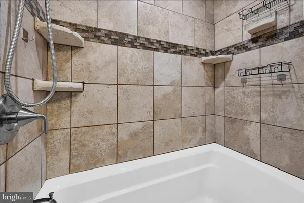 a bathroom with a bathtub