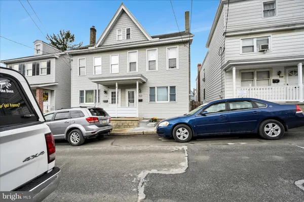 a car parked in front of a house