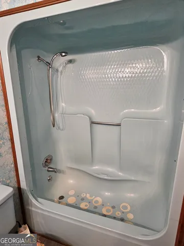 a bathroom with a tub