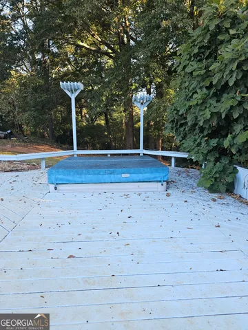 a view of a tree in a yard