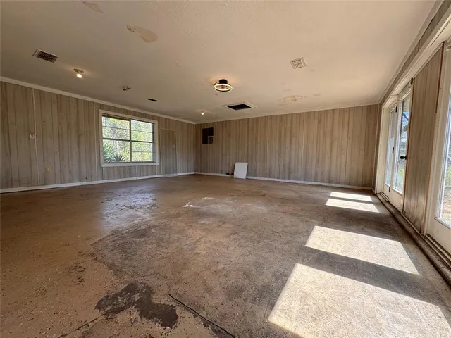 an empty room with windows